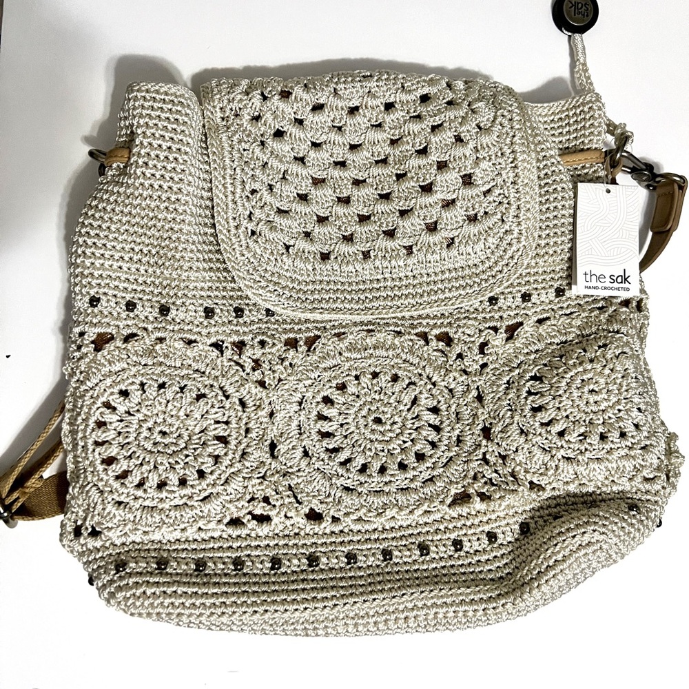 The Sak hand-crocheted “Sayulita” backpack purse. NWT